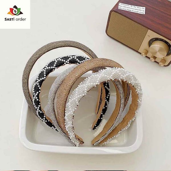 Elegant Diamond Headband adorned with sparkling diamond-like embellishments, perfect for adding glamour to any hairstyle.