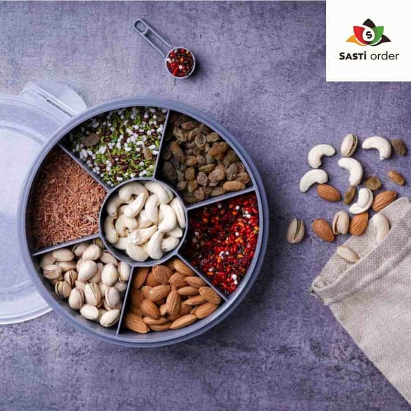 A stylish 7 Section Spice Box with seven compartments and a clear lid, designed for organizing spices and herbs in the kitchen.