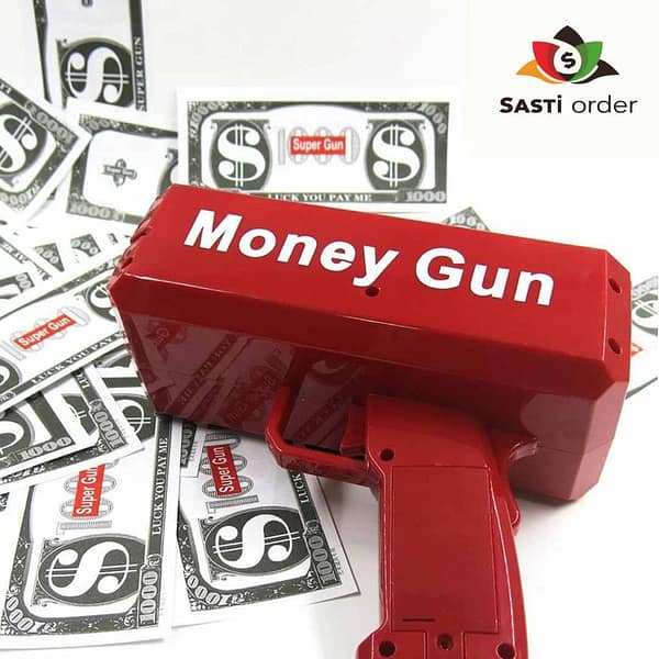 Rain Money Gun Toy Pistol shooting out paper money, perfect for parties and celebrations.