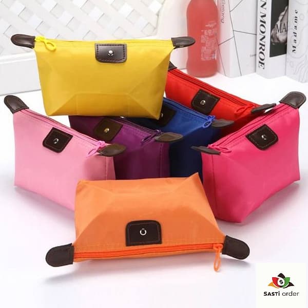 Women's toiletries organizer bag with multiple compartments, hanging hook, and water-resistant material for travel and daily use.