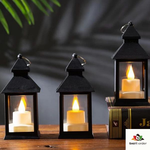 Antique-style vintage lantern with a metal frame and energy-efficient LED lights, emitting a warm, flickering glow. Ideal for indoor and outdoor decorative use.